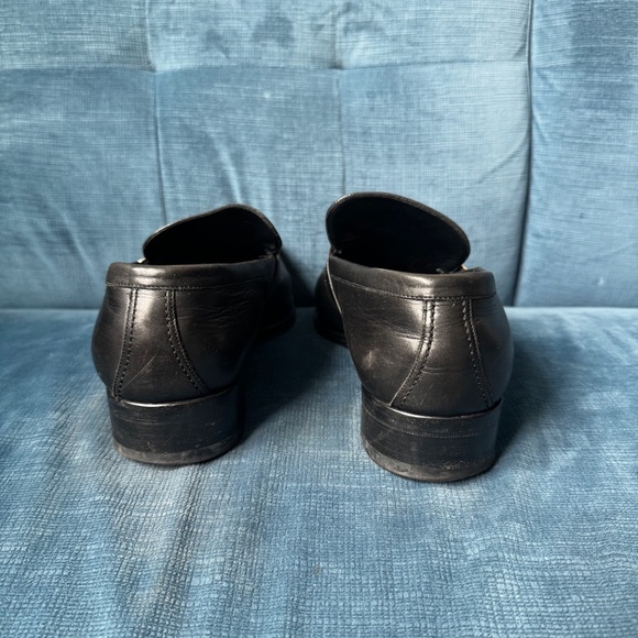 Black Gucci loafers